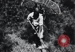 Image of Korean farmer's wife and son collect wood Korea, 1936, second 43 stock footage video 65675028854