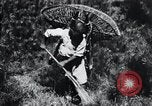 Image of Korean farmer's wife and son collect wood Korea, 1936, second 45 stock footage video 65675028854