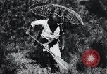 Image of Korean farmer's wife and son collect wood Korea, 1936, second 46 stock footage video 65675028854