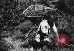 Image of Korean farmer's wife and son collect wood Korea, 1936, second 47 stock footage video 65675028854
