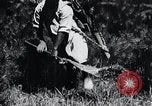 Image of Korean farmer's wife and son collect wood Korea, 1936, second 52 stock footage video 65675028854