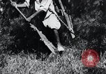 Image of Korean farmer's wife and son collect wood Korea, 1936, second 56 stock footage video 65675028854