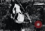 Image of Korean farmer's wife and son collect wood Korea, 1936, second 57 stock footage video 65675028854