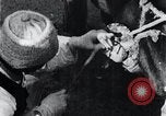 Standbild koreanischen Bauern Nägel Stahl Schuhe zu seiner Bulle Korea, 1936, aus Sekunde 31 historischem Filmmaterial Videoclip 65675028856