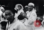 Standbild koreanischen Dorfbewohnern beschwichtigen lokale Spirituosen Korea, 1936, aus Sekunde 56 historischem Filmmaterial Videoclip 65675028858