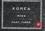 Image of Bull loaded with crop Korea, 1936, second 5 stock footage video 65675028860