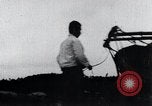 Image of Bull loaded with crop Korea, 1936, second 14 stock footage video 65675028860