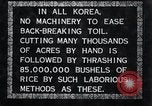 Image of threshing Korea, 1936, second 6 stock footage video 65675028861