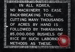 Image of threshing Korea, 1936, second 10 stock footage video 65675028861