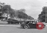 Standbild Straßen mit Menschen und Fahrzeugen Saigon Vietnam, 1955, aus Sekunde 48 historischem Filmmaterial Videoclip 65675028880