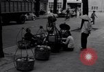 Image of street fountain Saigon Vietnam, 1955, second 32 stock footage video 65675028886