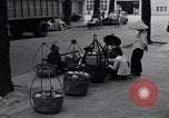 Image of street fountain Saigon Vietnam, 1955, second 39 stock footage video 65675028886