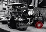 Image of street fountain Saigon Vietnam, 1955, second 51 stock footage video 65675028886