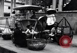 Image of street fountain Saigon Vietnam, 1955, second 52 stock footage video 65675028886