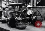 Image of street fountain Saigon Vietnam, 1955, second 53 stock footage video 65675028886