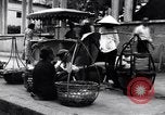 Image of street fountain Saigon Vietnam, 1955, second 57 stock footage video 65675028886