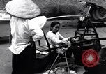 Image of street fountain Saigon Vietnam, 1955, second 59 stock footage video 65675028886