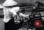 Image of street fountain Saigon Vietnam, 1955, second 61 stock footage video 65675028886