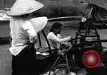 Image of street fountain Saigon Vietnam, 1955, second 62 stock footage video 65675028886