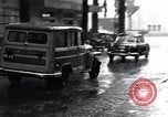 Image of cars moving in heavy rain Saigon Vietnam, 1955, second 31 stock footage video 65675028887
