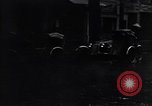 Image of cars moving in heavy rain Saigon Vietnam, 1955, second 41 stock footage video 65675028887