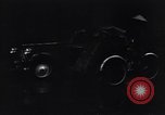 Image of cars moving in heavy rain Saigon Vietnam, 1955, second 44 stock footage video 65675028887