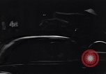 Image of cars moving in heavy rain Saigon Vietnam, 1955, second 47 stock footage video 65675028887
