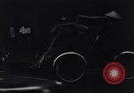 Image of cars moving in heavy rain Saigon Vietnam, 1955, second 48 stock footage video 65675028887