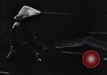 Image of cars moving in heavy rain Saigon Vietnam, 1955, second 51 stock footage video 65675028887