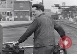 Image of French railroad yard workers Paris France, 1954, second 36 stock footage video 65675028936