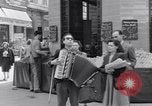 Image of busy city markets Paris France, 1954, second 50 stock footage video 65675028937