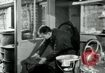 Immagine di Francese operaio di fabbrica Robert e i suoi genitori Isbergues Francia, 1952, secondo 16 filmato di repertorio 65675028941