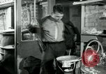 Immagine di Francese operaio di fabbrica Robert e i suoi genitori Isbergues Francia, 1952, secondo 17 filmato di repertorio 65675028941