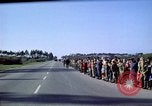 Standbild Präsident Kennedy's Konvoi Vandenberg Air Force Base California USA, 1962, aus Sekunde 20 historischem Filmmaterial Videoclip 65675028977