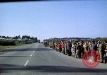 Standbild Präsident Kennedy's Konvoi Vandenberg Air Force Base California USA, 1962, aus Sekunde 25 historischem Filmmaterial Videoclip 65675028977