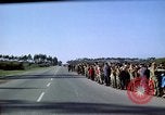 Standbild Präsident Kennedy's Konvoi Vandenberg Air Force Base California USA, 1962, aus Sekunde 30 historischem Filmmaterial Videoclip 65675028977