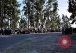 Standbild Präsident Kennedy's Konvoi Vandenberg Air Force Base California USA, 1962, aus Sekunde 35 historischem Filmmaterial Videoclip 65675028977