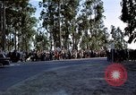 Standbild Präsident Kennedy's Konvoi Vandenberg Air Force Base California USA, 1962, aus Sekunde 47 historischem Filmmaterial Videoclip 65675028977