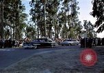 Standbild Präsident Kennedy's Konvoi Vandenberg Air Force Base California USA, 1962, aus Sekunde 53 historischem Filmmaterial Videoclip 65675028977
