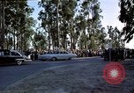 Standbild Präsident Kennedy's Konvoi Vandenberg Air Force Base California USA, 1962, aus Sekunde 55 historischem Filmmaterial Videoclip 65675028977
