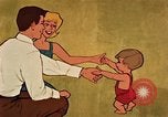 Immagine di Giovane con un neonato United States USA, 1964, secondo 55 filmato di repertorio 65675029102