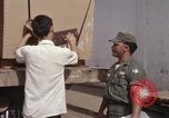 Image stencil caisses d'alimentation Saigon Vietnam, 1967, de la seconde 36 séquences d'archives historiques vidéo 65675029143