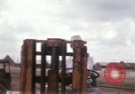 Immagine di Carico-scarico dei materiali di consumo Saigon Vietnam, 1967, secondo 25 filmato di repertorio 65675029144