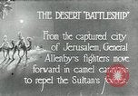 Standbild camel Caravan der britischen Truppen Palästina, 1918, aus Sekunde 1 historischem Filmmaterial Videoclip 65675029252