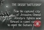 Standbild camel Caravan der britischen Truppen Palästina, 1918, aus Sekunde 6 historischem Filmmaterial Videoclip 65675029252