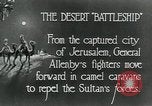 Standbild camel Caravan der britischen Truppen Palästina, 1918, aus Sekunde 7 historischem Filmmaterial Videoclip 65675029252