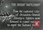 Standbild camel Caravan der britischen Truppen Palästina, 1918, aus Sekunde 12 historischem Filmmaterial Videoclip 65675029252