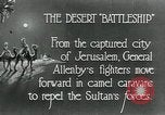 Standbild camel Caravan der britischen Truppen Palästina, 1918, aus Sekunde 13 historischem Filmmaterial Videoclip 65675029252