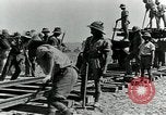 Image of British Engineers build a railroad in the desert Palestine, 1918, second 23 stock footage video 65675029254
