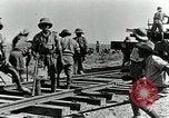 Image of British Engineers build a railroad in the desert Palestine, 1918, second 32 stock footage video 65675029254